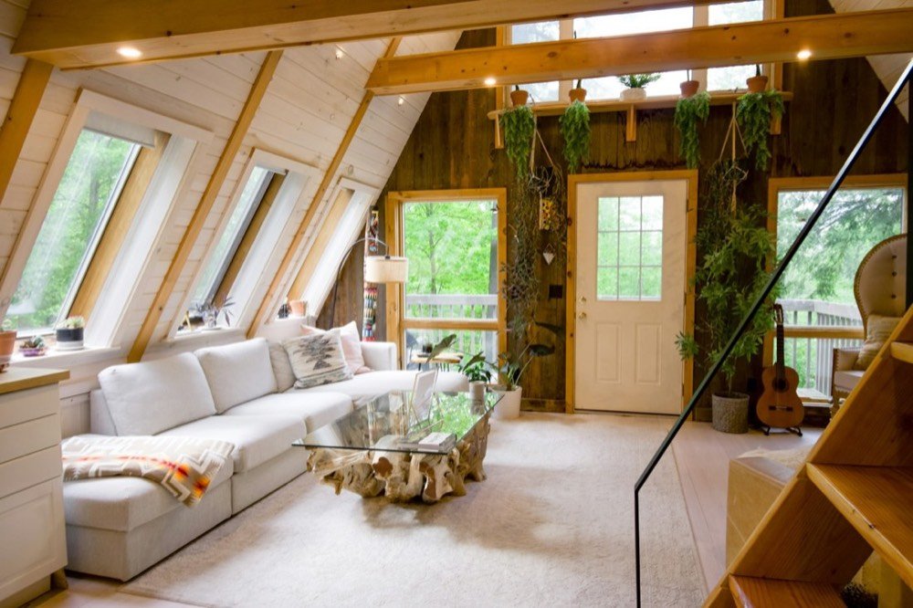 Bright A-frame cabin living room